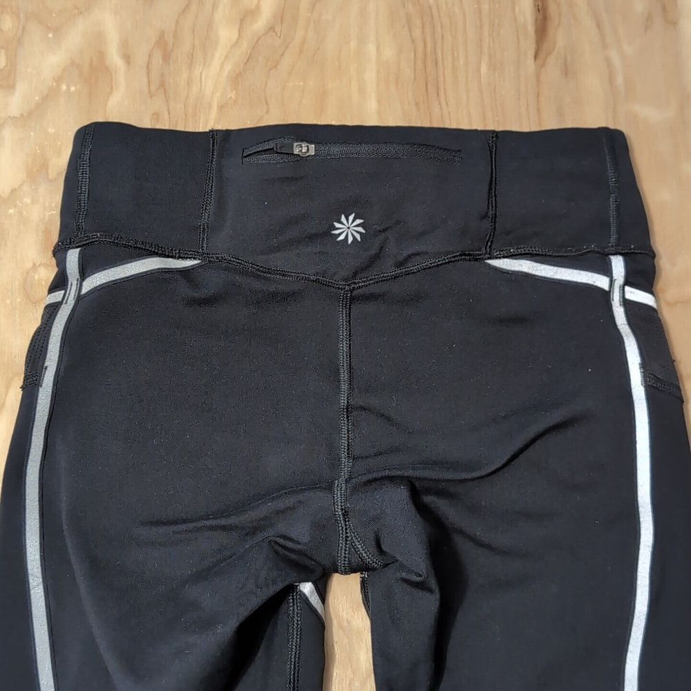 ATHLETA Tailwind Reflective 7/8 Tight In SuperSonic Le Black Size XS 25x27